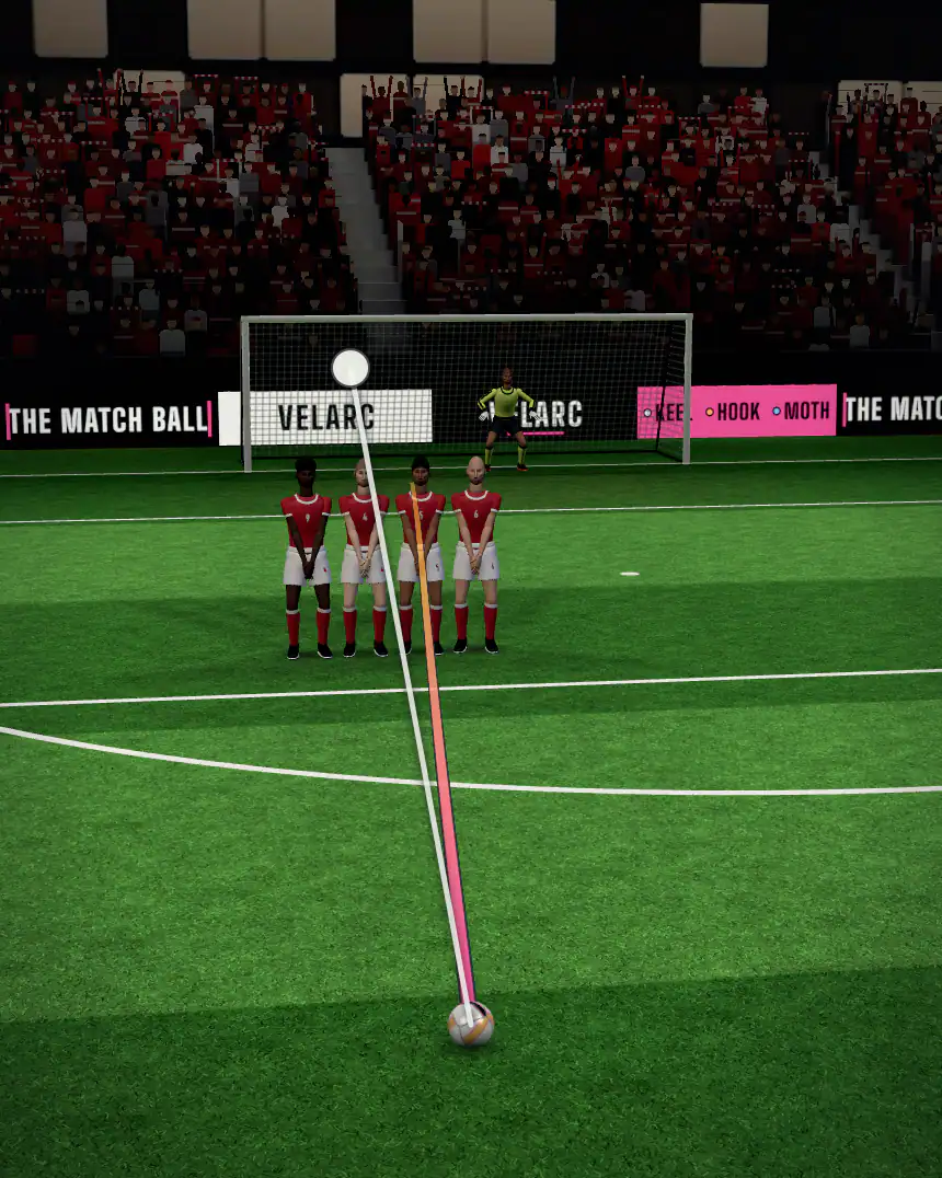 Swipe through the ball towards the goal.