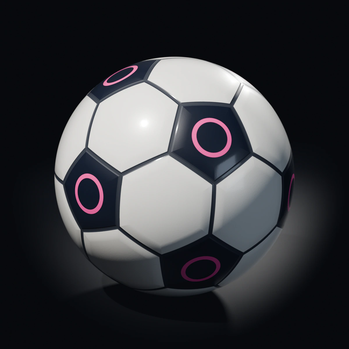 Velarc Keel match ball, white hexagons and navy pentagons with pink rings, on a dark studio floor