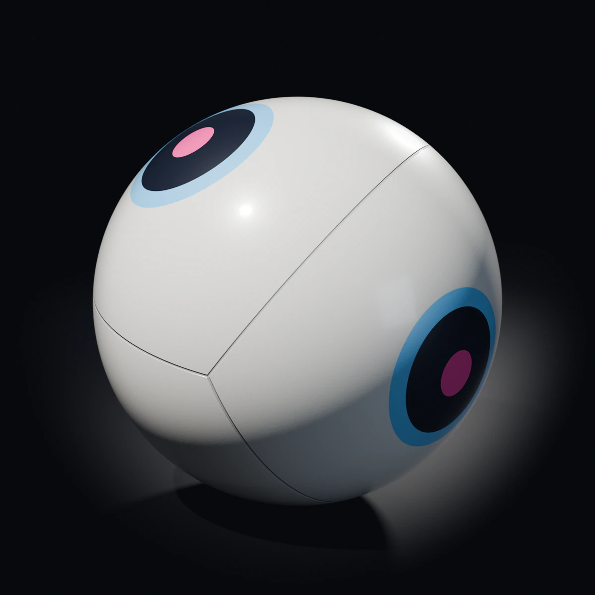 Velarc Moth match ball, plain white with four sky-blue eye-spots, on a dark studio floor